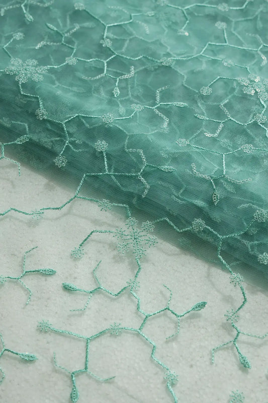 AIzaSyBcstauz-XMPRhEY21AUzeo032pxrXB5Ug - Beautiful Water Sequins Small Floral Embroidery On Sea Green Soft Net Fabric