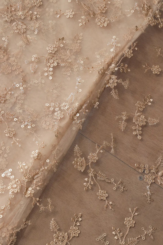 AIzaSyBcstauz-XMPRhEY21AUzeo032pxrXB5Ug - Gold Sequins With Thread Work Floral Embroidery On Beige Soft Net Fabric