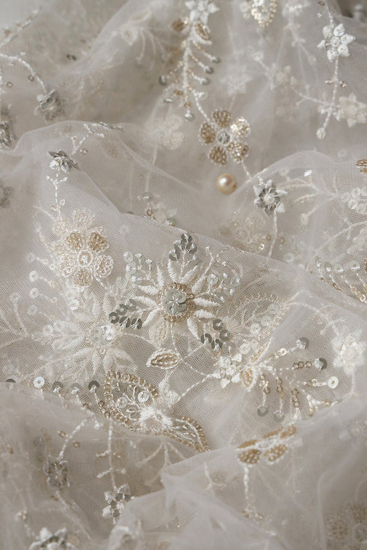 AIzaSyBcstauz-XMPRhEY21AUzeo032pxrXB5Ug - Beautiful White Thread With Sequins Floral Embroidery Work On White Dyeable Soft Net Fabric