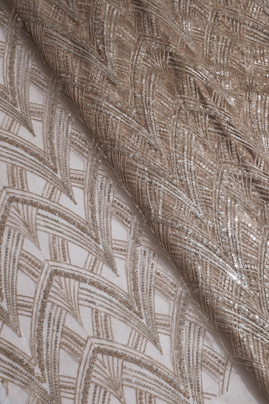 AIzaSyBcstauz-XMPRhEY21AUzeo032pxrXB5Ug - Beige Thread With Gold And Silver Sequins Geometric Embroidery Work On Beige Soft Net Fabric
