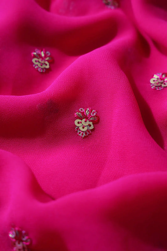 AIzaSyBcstauz-XMPRhEY21AUzeo032pxrXB5Ug - Gold Sequins With Zari Small Floral Booti Embroidery On Fuchsia Georgette Fabric