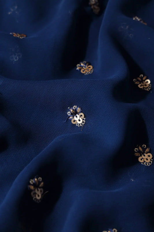 AIzaSyBcstauz-XMPRhEY21AUzeo032pxrXB5Ug - Gold Sequins With Zari Small Floral Booti Embroidery On Prussian Blue Georgette Fabric