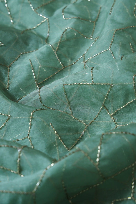 AIzaSyBcstauz-XMPRhEY21AUzeo032pxrXB5Ug - Cut Dana Beads Appealing Abstract Embroidery On Olive Organza Fabric