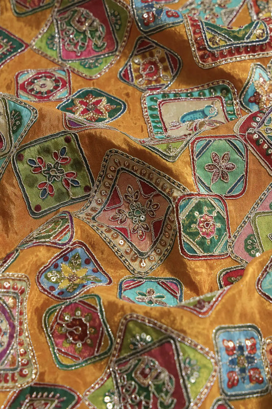 AIzaSyBcstauz-XMPRhEY21AUzeo032pxrXB5Ug - Gold Zari With Sequins Traditional Positional Print On Mustard Yellow Pure Viscose Zari Tissue Fabric