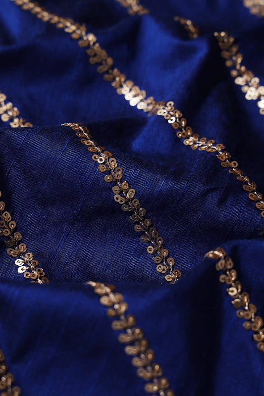 AIzaSyBcstauz-XMPRhEY21AUzeo032pxrXB5Ug - Gold Sequins With Gold Zari Stripes Embroidery Work On Royal Blue Raw Silk Fabric