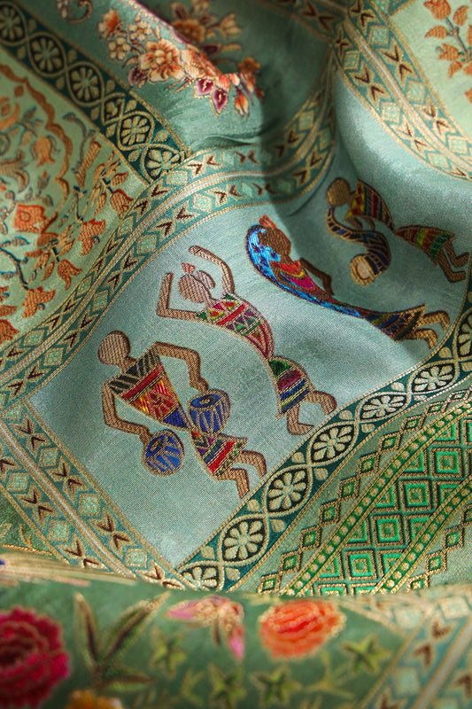 Positional Floral Print On Pastel Olive Viscose Dola Silk Jacquard Fabric