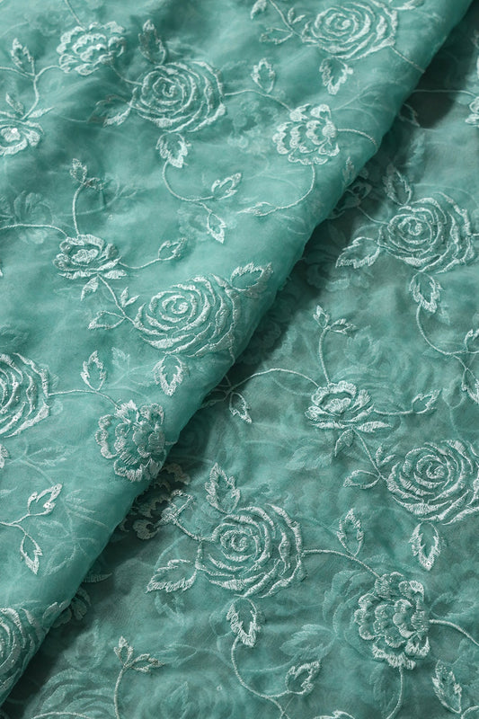 AIzaSyBcstauz-XMPRhEY21AUzeo032pxrXB5Ug - Beautiful Water Sequins With Thread Floral Embroidery On Teal Organza Fabric