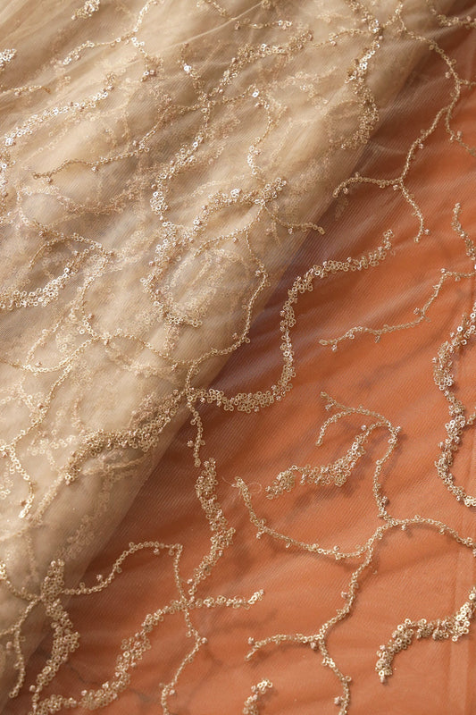 AIzaSyBcstauz-XMPRhEY21AUzeo032pxrXB5Ug - Beige Thread With Gold Glitter Sequins Abstract Embroidery On Beige Soft Net Fabric