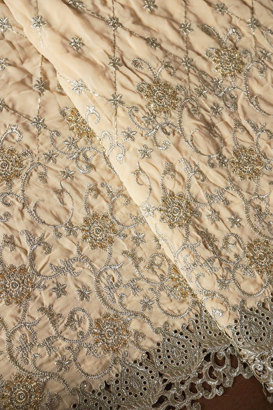 AIzaSyBcstauz-XMPRhEY21AUzeo032pxrXB5Ug - Big Width''56'' Gold And Silver Zari Floral Embroidery Work On Beige Georgette Fabric With Border
