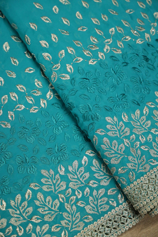 AIzaSyBcstauz-XMPRhEY21AUzeo032pxrXB5Ug - Big Width''56'' Silver Zari Leafy Embroidery Work On Rama Georgette Fabric With Border