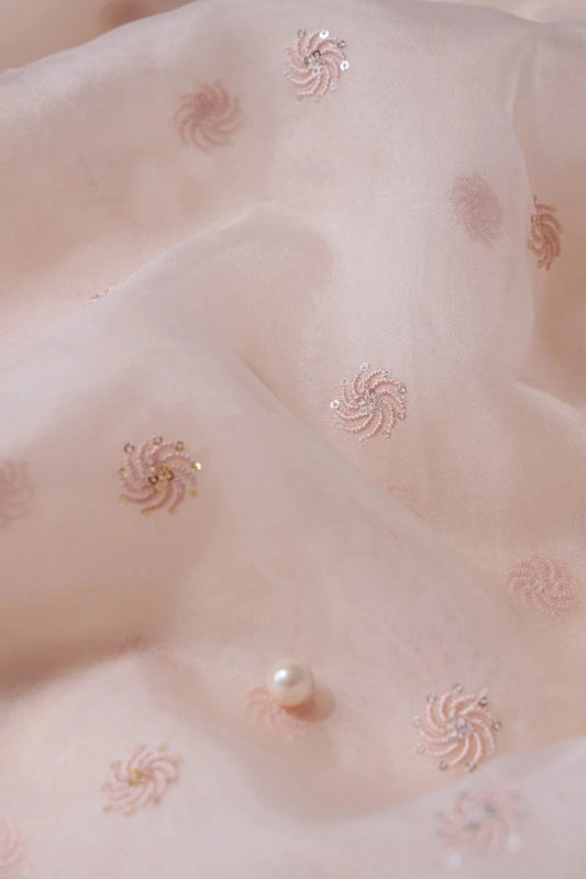 AIzaSyBcstauz-XMPRhEY21AUzeo032pxrXB5Ug - Gold And Silver Sequins Beautiful Small Motif Embroidery Work On Pastel Peach Organza Fabric