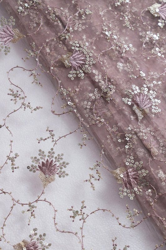 AIzaSyBcstauz-XMPRhEY21AUzeo032pxrXB5Ug - Gold And Silver Sequins With Mauve Thread Floral Embroidery Work On Mauve Soft Net Fabric