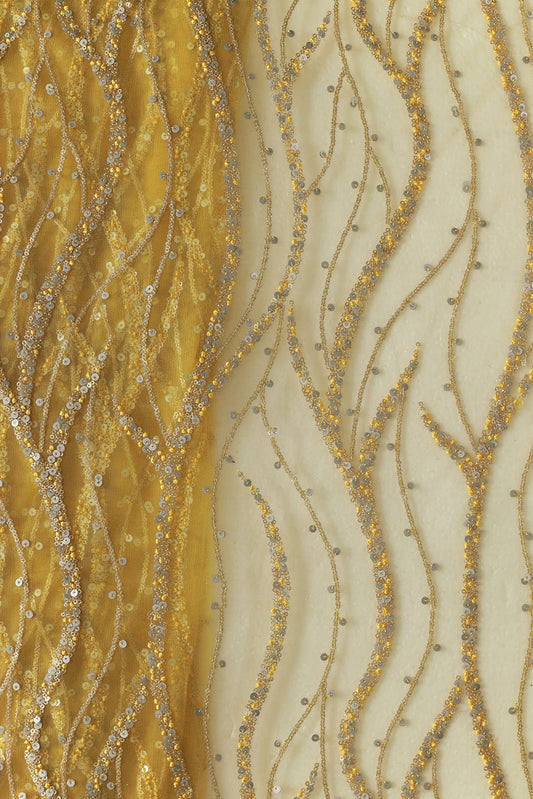 AIzaSyBcstauz-XMPRhEY21AUzeo032pxrXB5Ug - Gold And Silver Sequins With yellow Thread Wavy Embroidery Work On yellow Soft Net Fabric