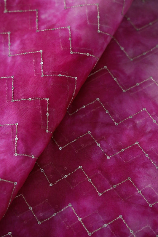 AIzaSyBcstauz-XMPRhEY21AUzeo032pxrXB5Ug - Gold Sequins Chevron Embroidery Work On Tie & Dye Dark Pink Organza Fabric