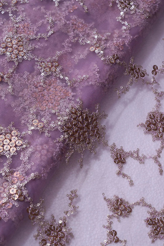 AIzaSyBcstauz-XMPRhEY21AUzeo032pxrXB5Ug - Gold Sequins With Lilac Thread Work Geometric Embroidery On Lilac Purple Soft Net Fabric