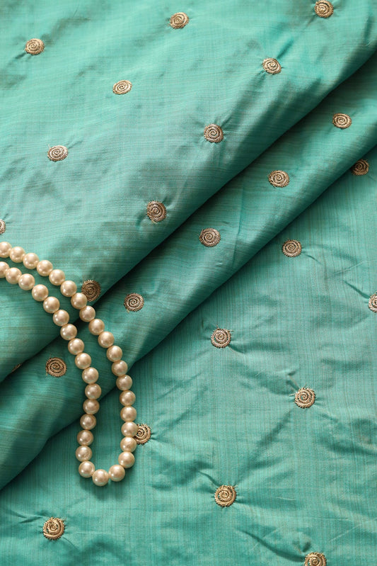 AIzaSyBcstauz-XMPRhEY21AUzeo032pxrXB5Ug - Gold Zari Small Motif Embroidery Work On Rama Bamboo Silk Fabric