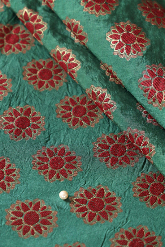 AIzaSyBcstauz-XMPRhEY21AUzeo032pxrXB5Ug - Green And Maroon Floral Butta Silk Gold Zari Banarasi Jacquard Fabric