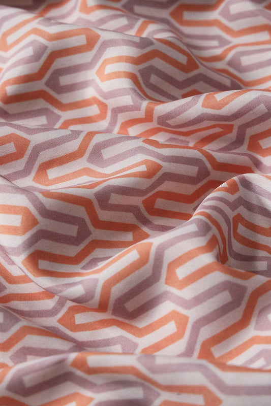 Light Orange And Light Purple Geometric Pattern Digital Print On French Crepe Fabric