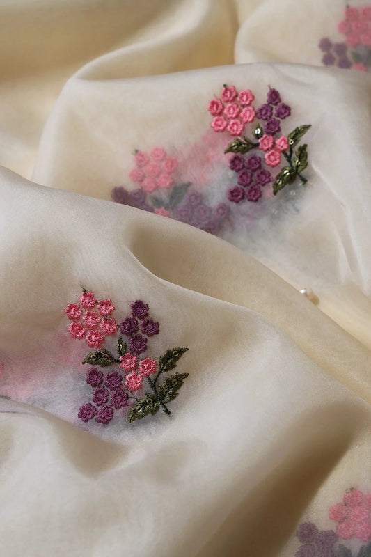 Pink And Mauve Thread With Sequins Floral Embroidery Work On Cream Organza Fabric