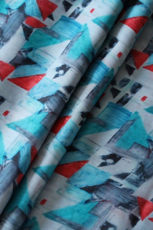 Sky Blue And Red Geometric Pattern Digital Print On Georgette Satin Fabric
