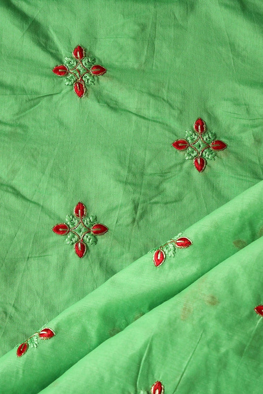Red And Green Thread With Gold Zari Embroidery Work On Green Chanderi Fabric
