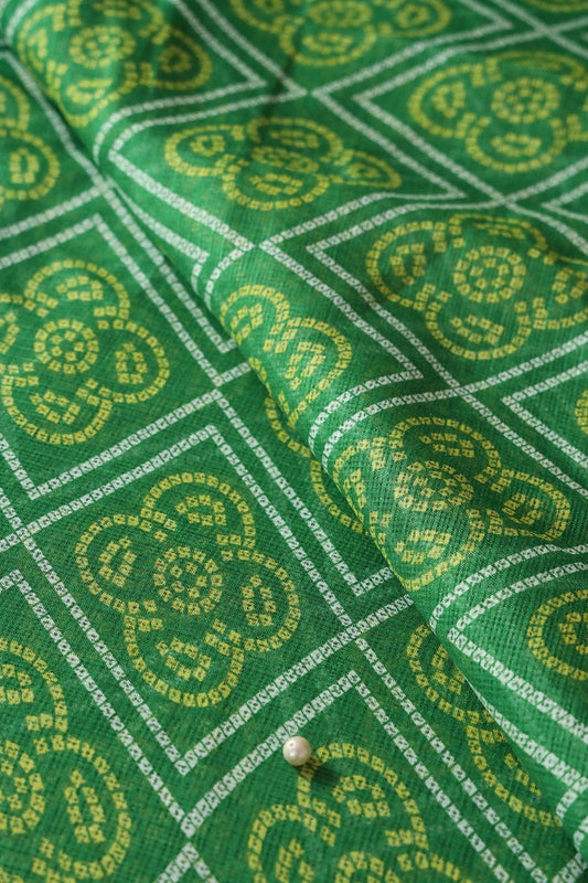 White And Yellow Bandhani Print On Green Kota Doria Fabric