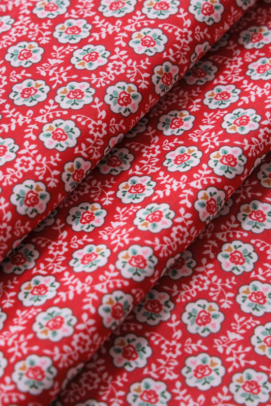 White Small Floral Pattern Digital Print On Red French Crepe Fabric
