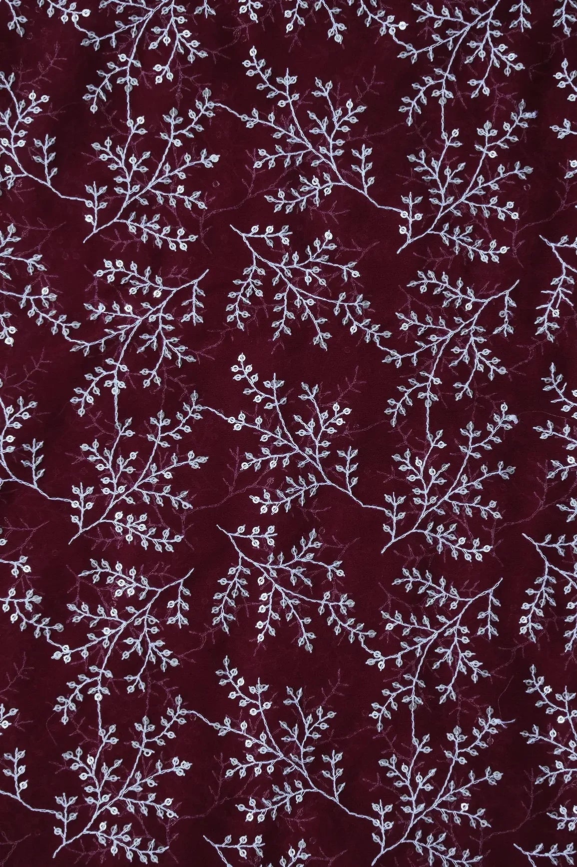 AIzaSyBcstauz-XMPRhEY21AUzeo032pxrXB5Ug - 3 Meter Cut Piece Of White Thread With Gold Sequins Leafy Embroidery On Maroon Georgette Fabric