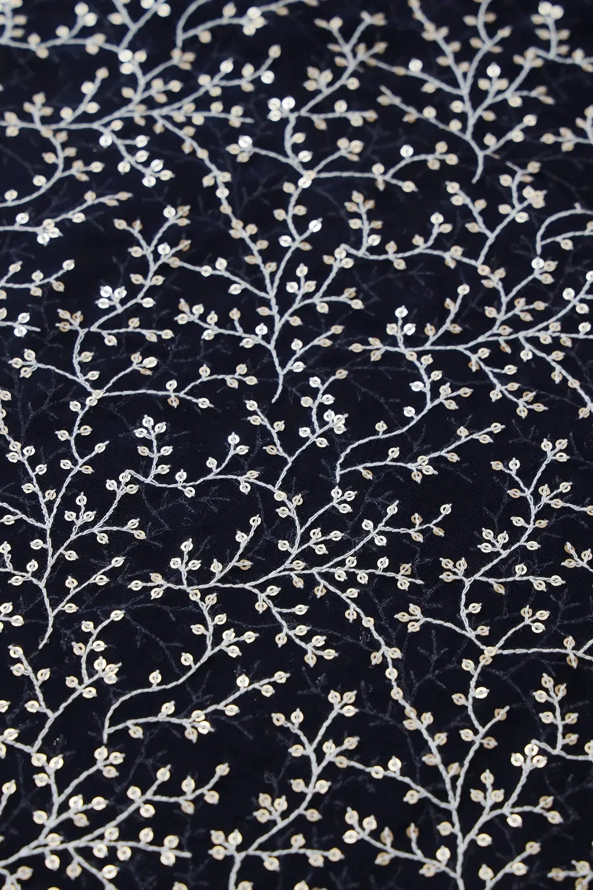 AIzaSyBcstauz-XMPRhEY21AUzeo032pxrXB5Ug - 3 Meter Cut Piece Of White Thread With Gold Sequins Leafy Embroidery On Navy Blue Georgette Fabric