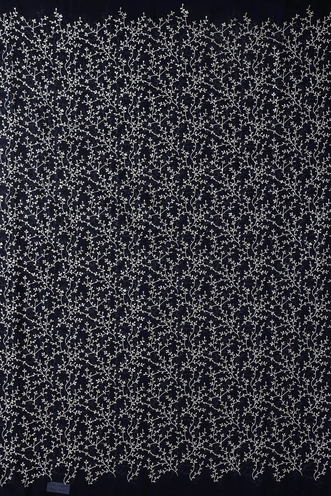 AIzaSyBcstauz-XMPRhEY21AUzeo032pxrXB5Ug - 3 Meter Cut Piece Of White Thread With Gold Sequins Leafy Embroidery On Navy Blue Georgette Fabric