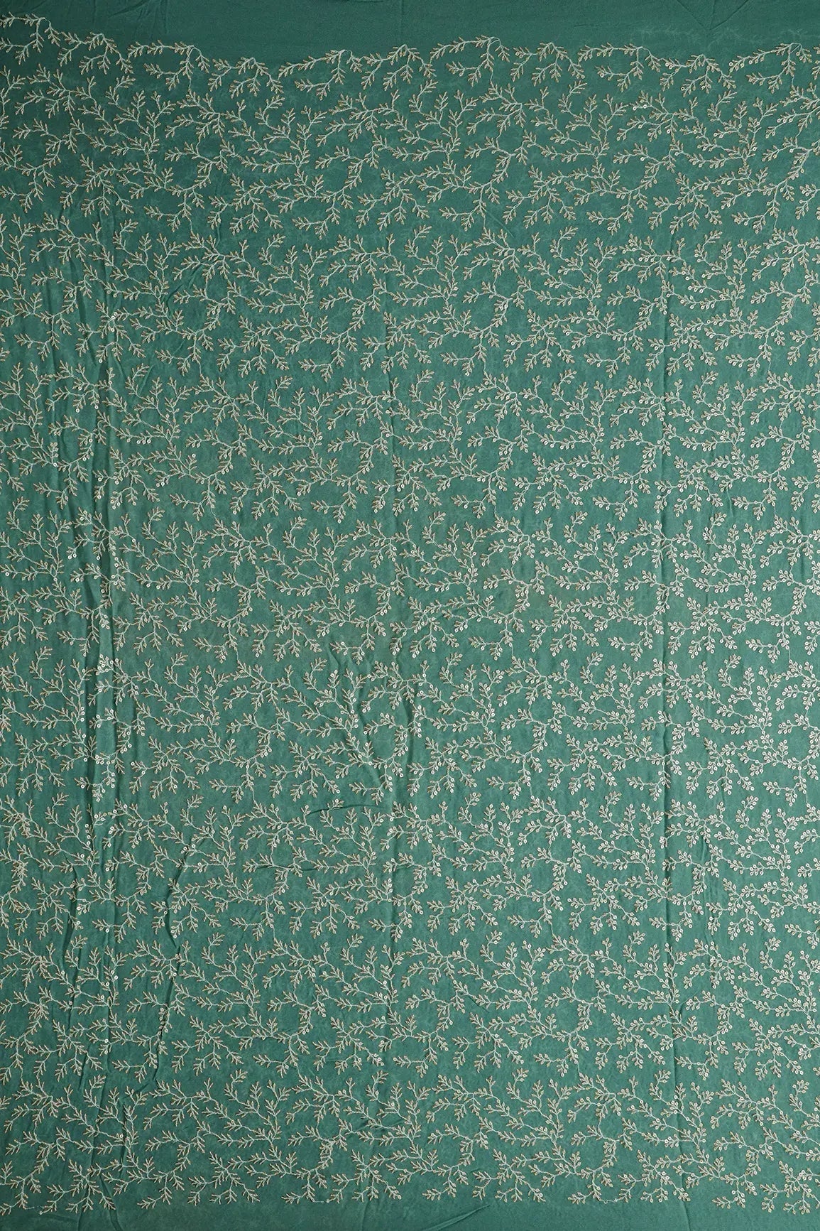 AIzaSyBcstauz-XMPRhEY21AUzeo032pxrXB5Ug - 3.25 Meter Cut Piece Of White Thread With Gold Sequins Leafy Embroidery On Teal Georgette Fabric