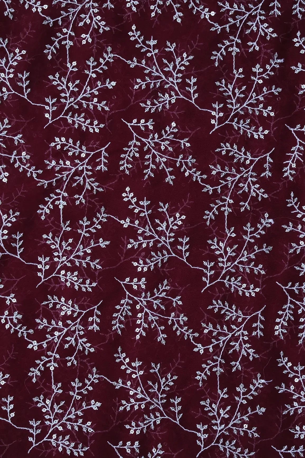 AIzaSyBcstauz-XMPRhEY21AUzeo032pxrXB5Ug - 3.50 Meter Cut Piece Of White Thread With Gold Sequins Leafy Embroidery On Maroon Georgette Fabric