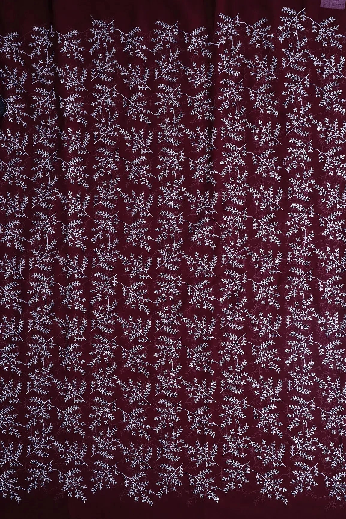 AIzaSyBcstauz-XMPRhEY21AUzeo032pxrXB5Ug - 3.50 Meter Cut Piece Of White Thread With Gold Sequins Leafy Embroidery On Maroon Georgette Fabric
