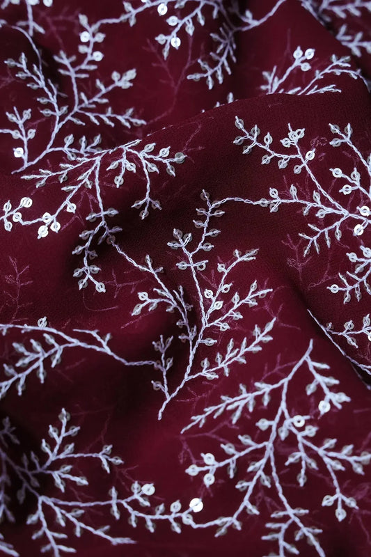 AIzaSyBcstauz-XMPRhEY21AUzeo032pxrXB5Ug - 3.50 Meter Cut Piece Of White Thread With Gold Sequins Leafy Embroidery On Maroon Georgette Fabric
