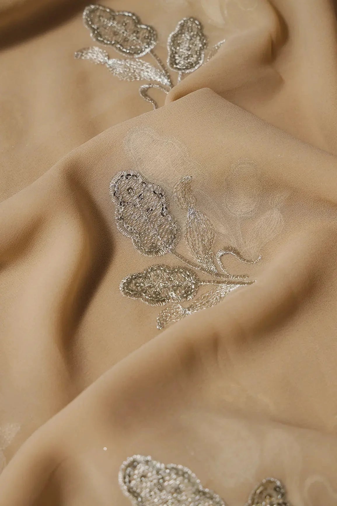 AIzaSyBcstauz-XMPRhEY21AUzeo032pxrXB5Ug - 3.75 Meter Cut Piece Of Gold Zari With Sequins Floral Embroidery On Beige Georgette Fabric