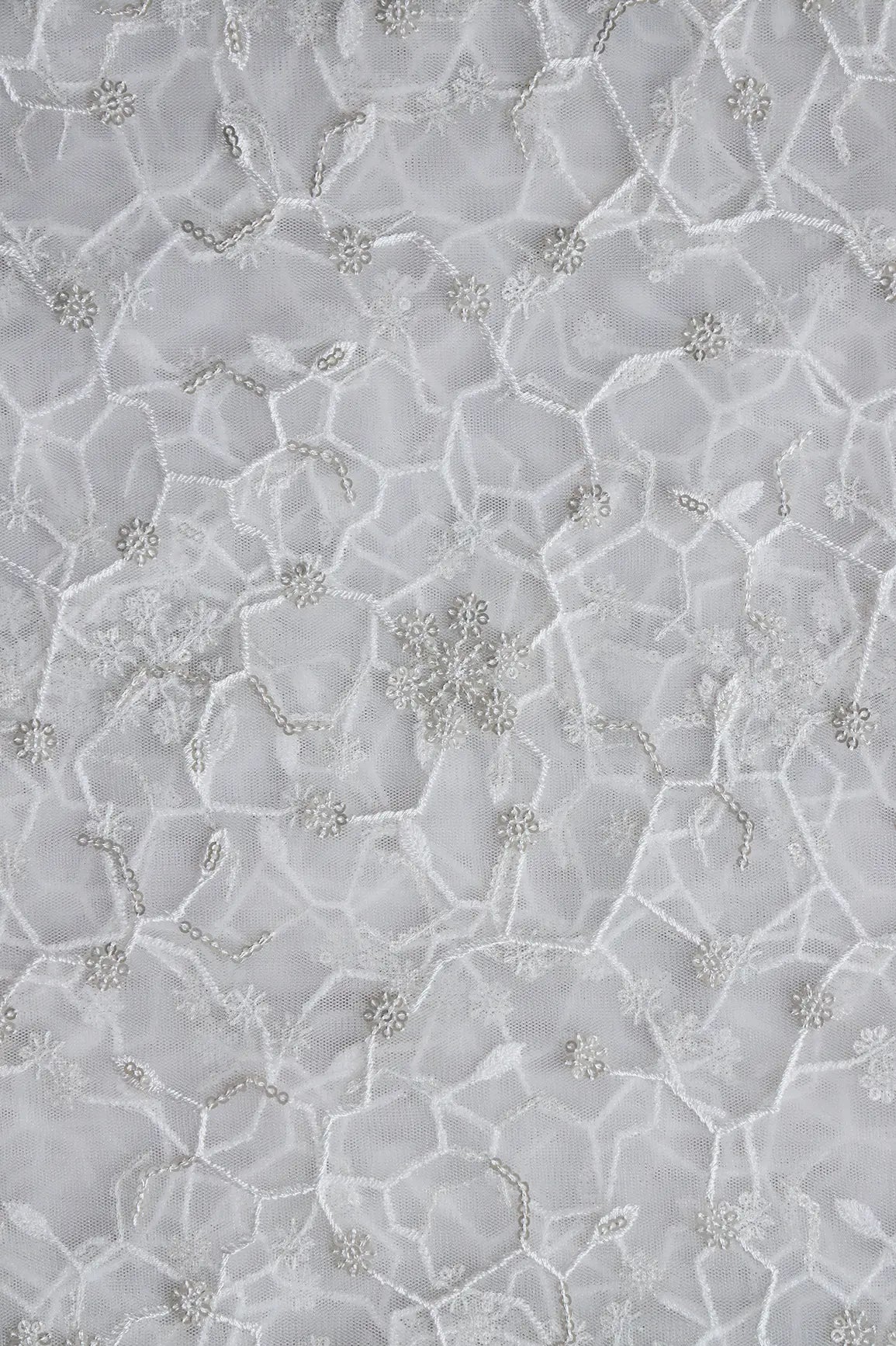 AIzaSyBcstauz-XMPRhEY21AUzeo032pxrXB5Ug - Beautiful Silver Sequins Small Floral Embroidery On White Dyeable Soft Net Fabric