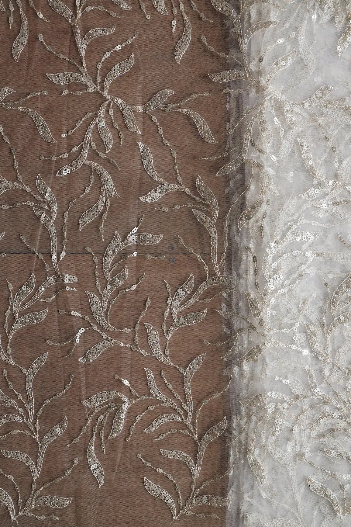 AIzaSyBcstauz-XMPRhEY21AUzeo032pxrXB5Ug - Gold And Silver Sequins Leafy Floral Embroidery On Dyeable White Soft Net Fabric