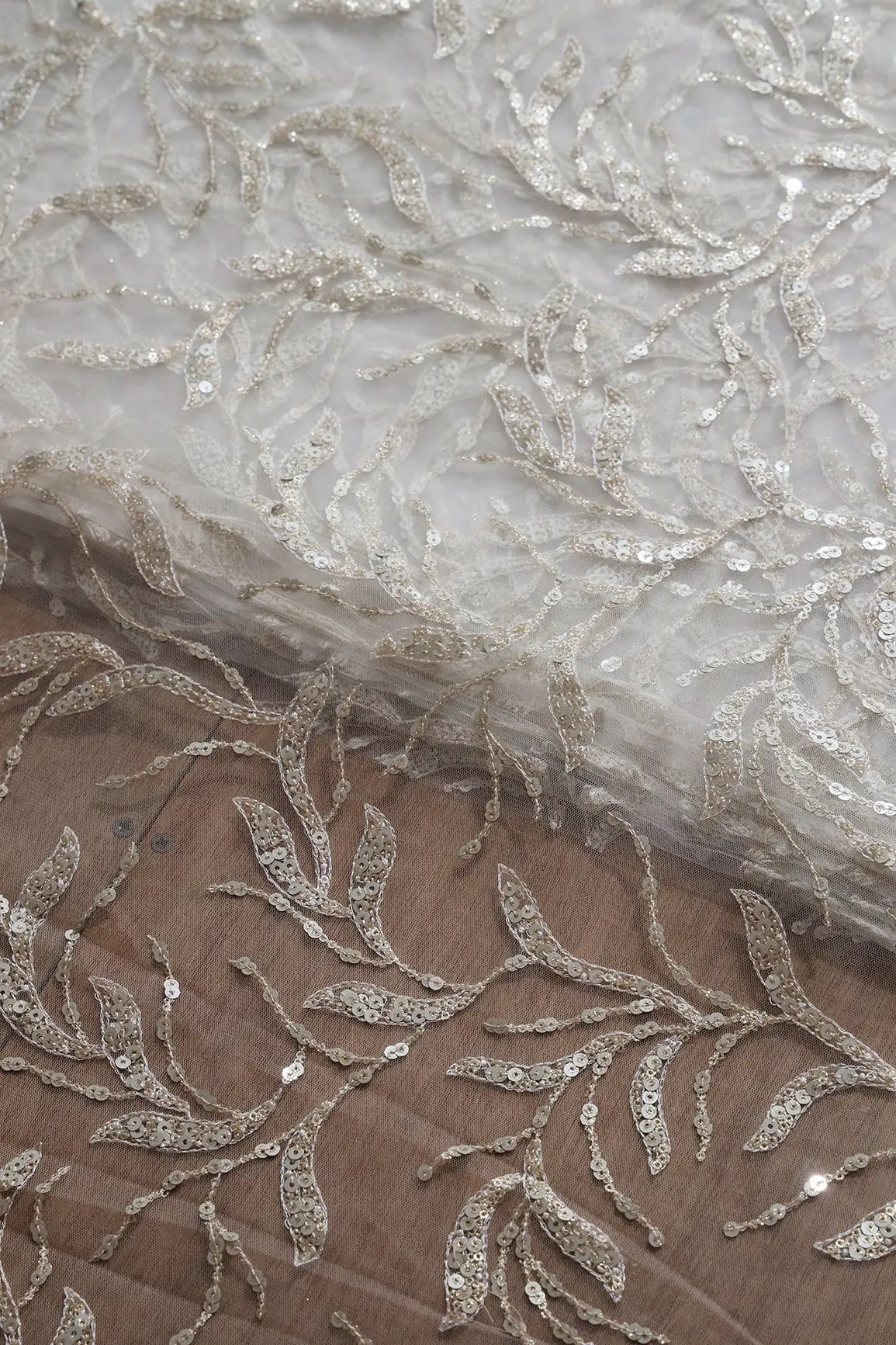 AIzaSyBcstauz-XMPRhEY21AUzeo032pxrXB5Ug - Gold And Silver Sequins Leafy Floral Embroidery On Dyeable White Soft Net Fabric