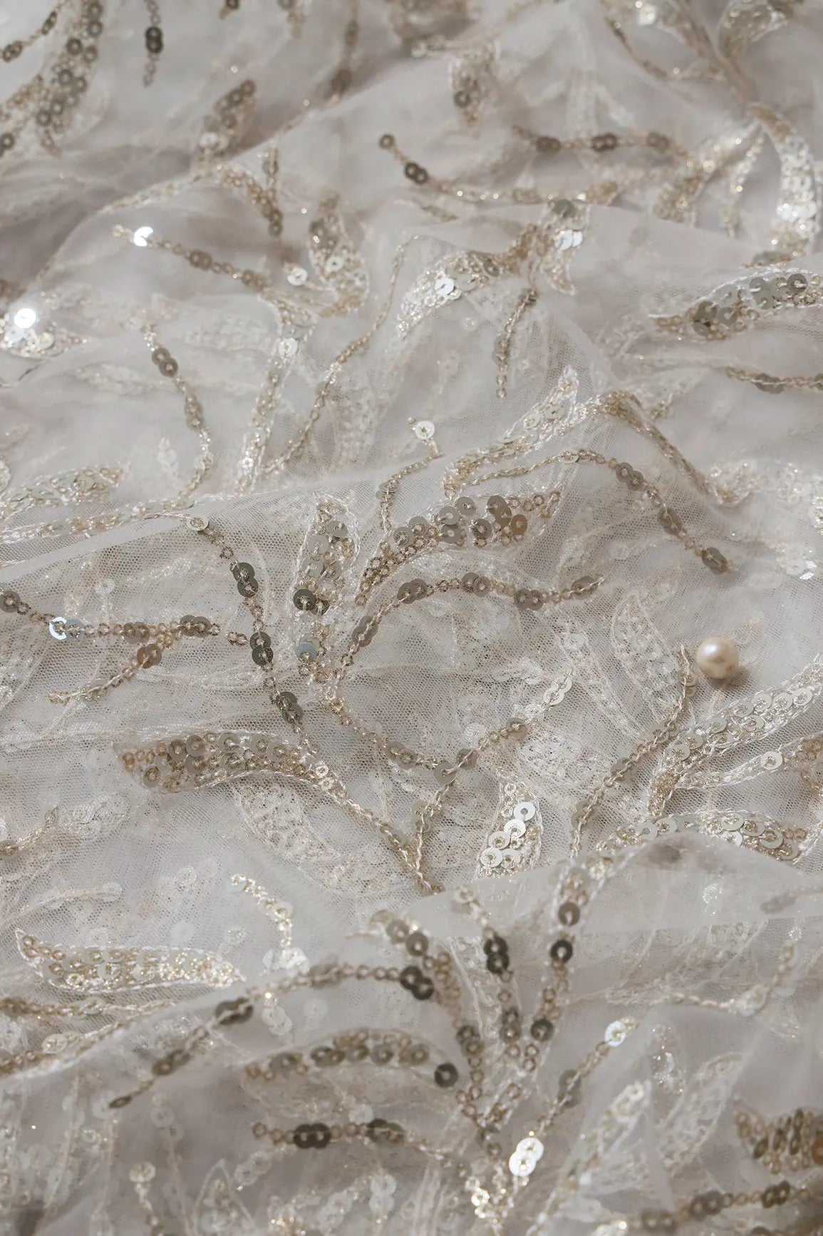 AIzaSyBcstauz-XMPRhEY21AUzeo032pxrXB5Ug - Gold And Silver Sequins Leafy Floral Embroidery On Dyeable White Soft Net Fabric