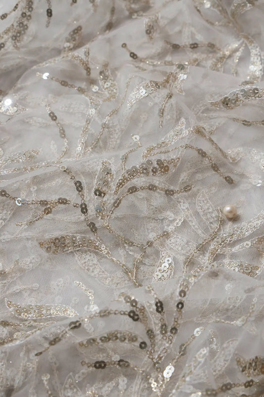 AIzaSyBcstauz-XMPRhEY21AUzeo032pxrXB5Ug - Gold And Silver Sequins Leafy Floral Embroidery On Dyeable White Soft Net Fabric