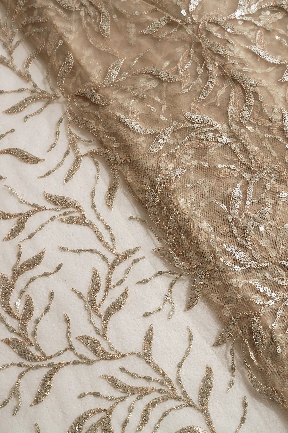 AIzaSyBcstauz-XMPRhEY21AUzeo032pxrXB5Ug - Gold And Silver Sequins Leafy Floral Embroidery On Beige Soft Net Fabric