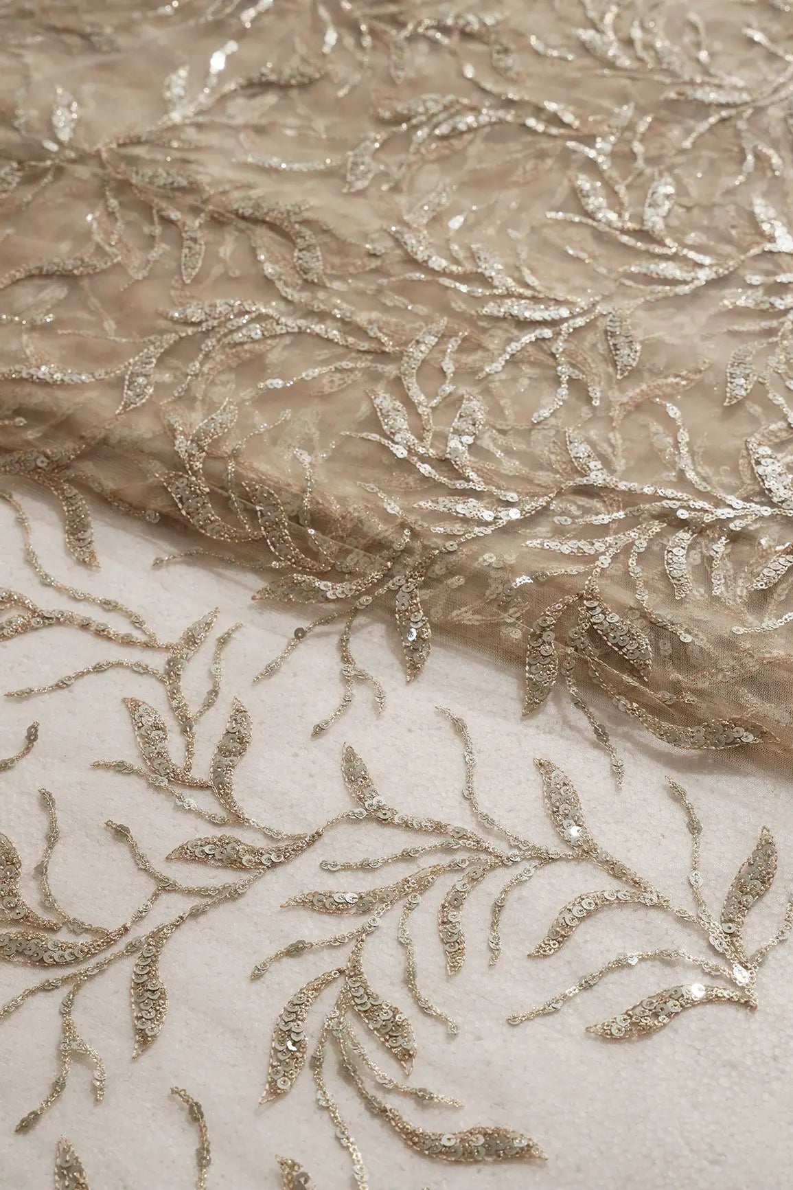 AIzaSyBcstauz-XMPRhEY21AUzeo032pxrXB5Ug - Gold And Silver Sequins Leafy Floral Embroidery On Beige Soft Net Fabric