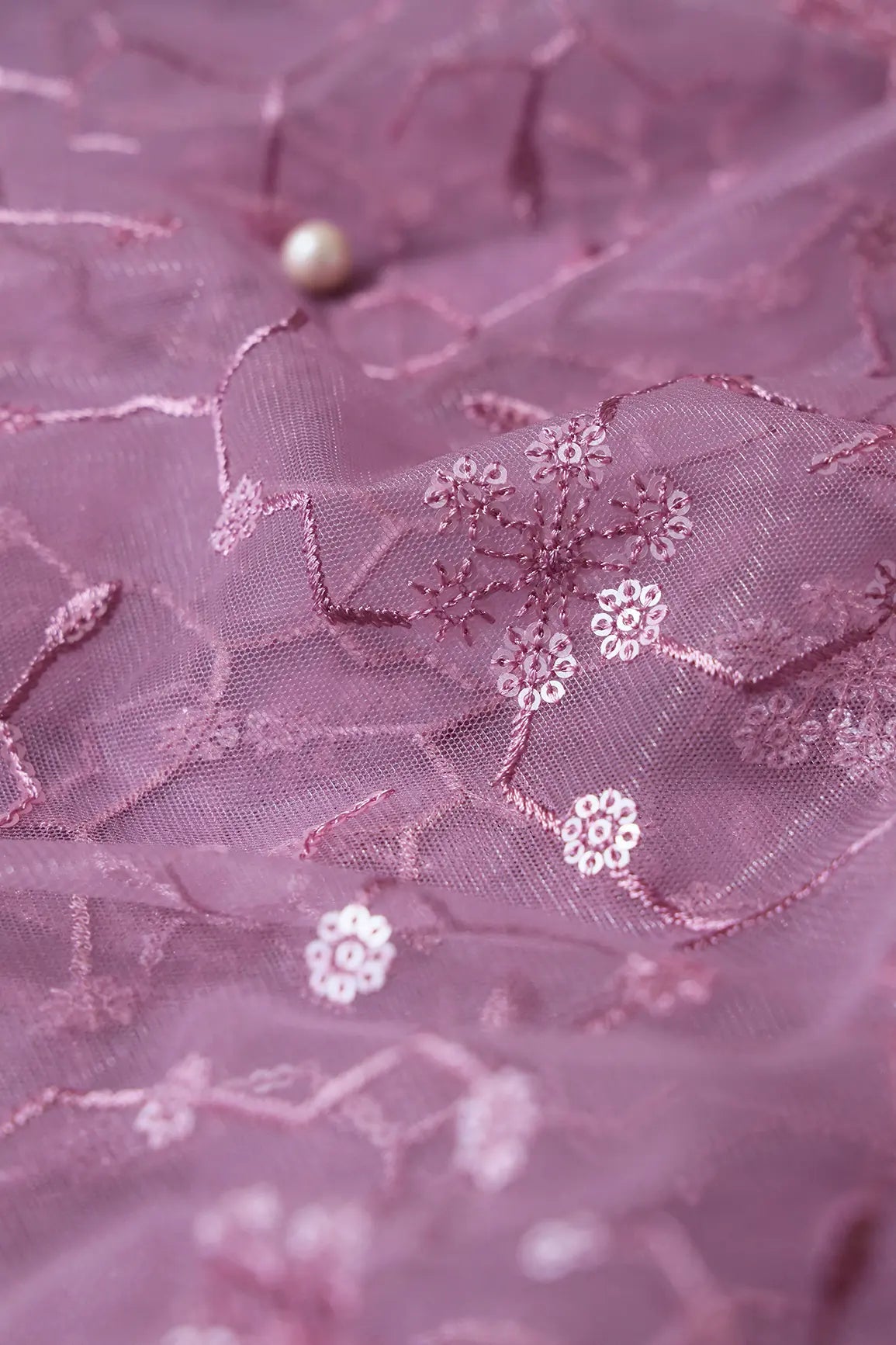 AIzaSyBcstauz-XMPRhEY21AUzeo032pxrXB5Ug - Beautiful Water Sequins Small Floral Embroidery On Mauve Soft Net Fabric