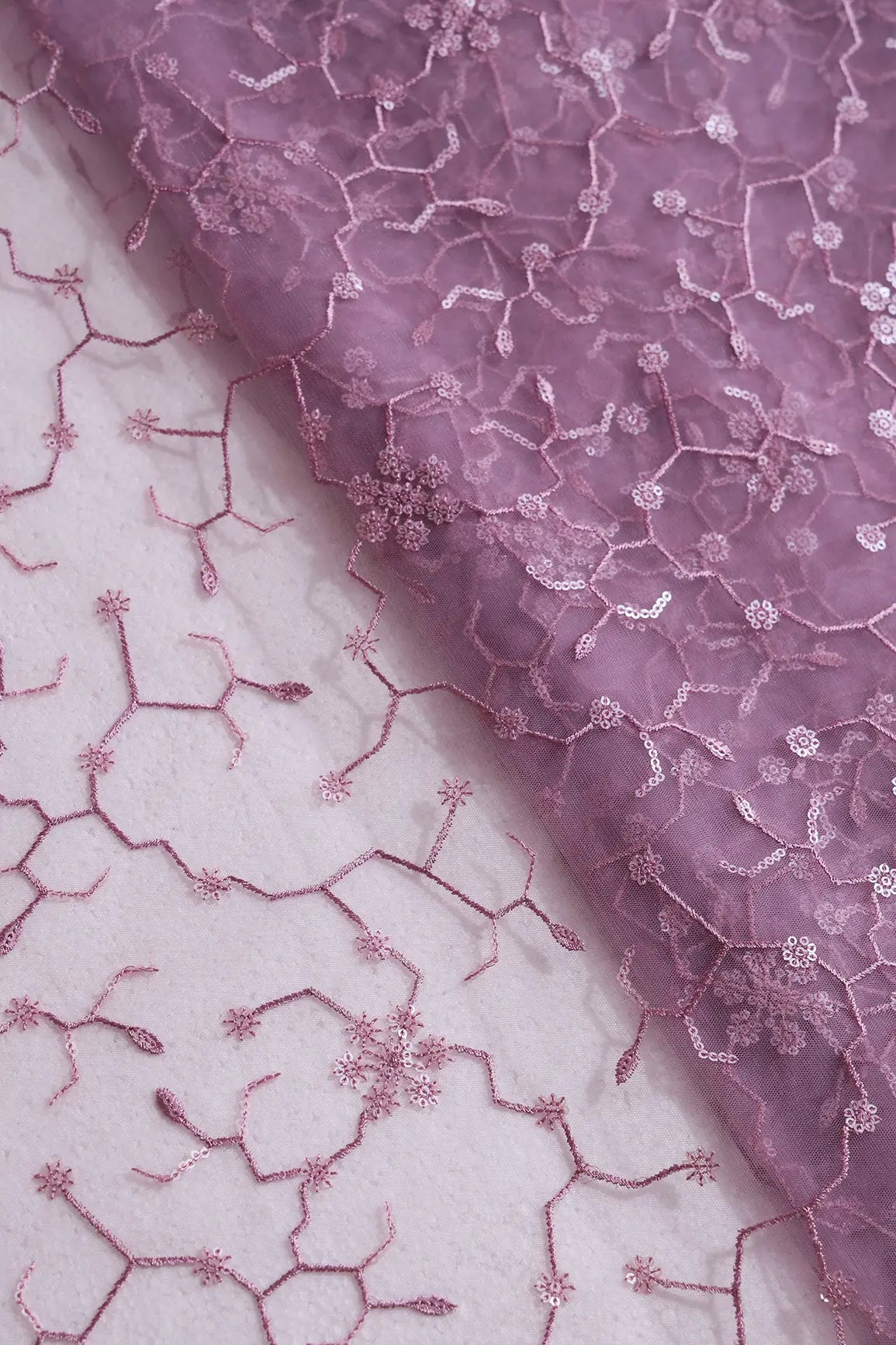 AIzaSyBcstauz-XMPRhEY21AUzeo032pxrXB5Ug - Beautiful Water Sequins Small Floral Embroidery On Mauve Soft Net Fabric
