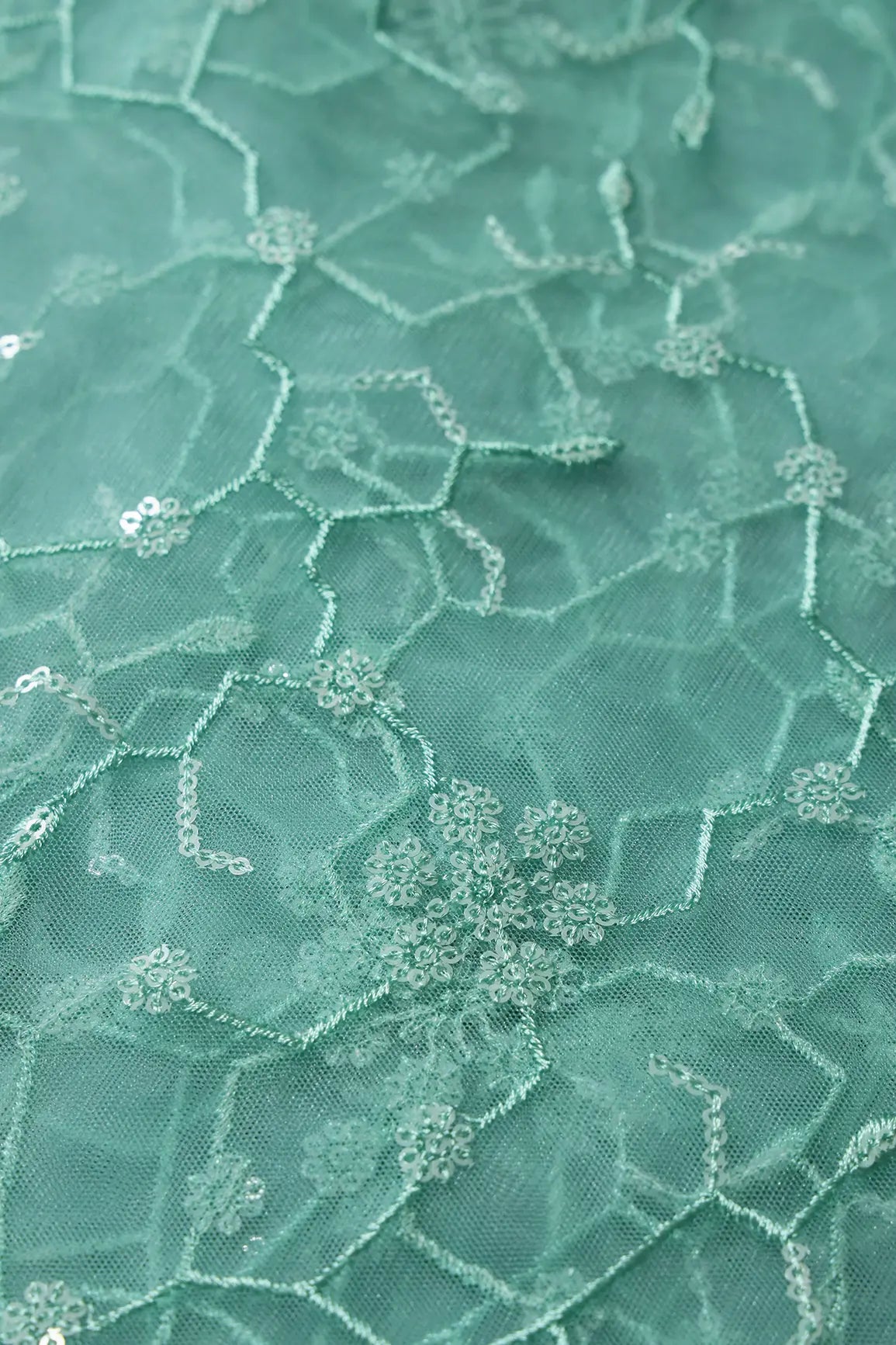 AIzaSyBcstauz-XMPRhEY21AUzeo032pxrXB5Ug - Beautiful Water Sequins Small Floral Embroidery On Sea Green Soft Net Fabric