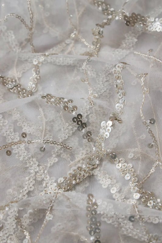 Silver Sequins Geometric Embroidery On White Dyeable Soft Net Fabric