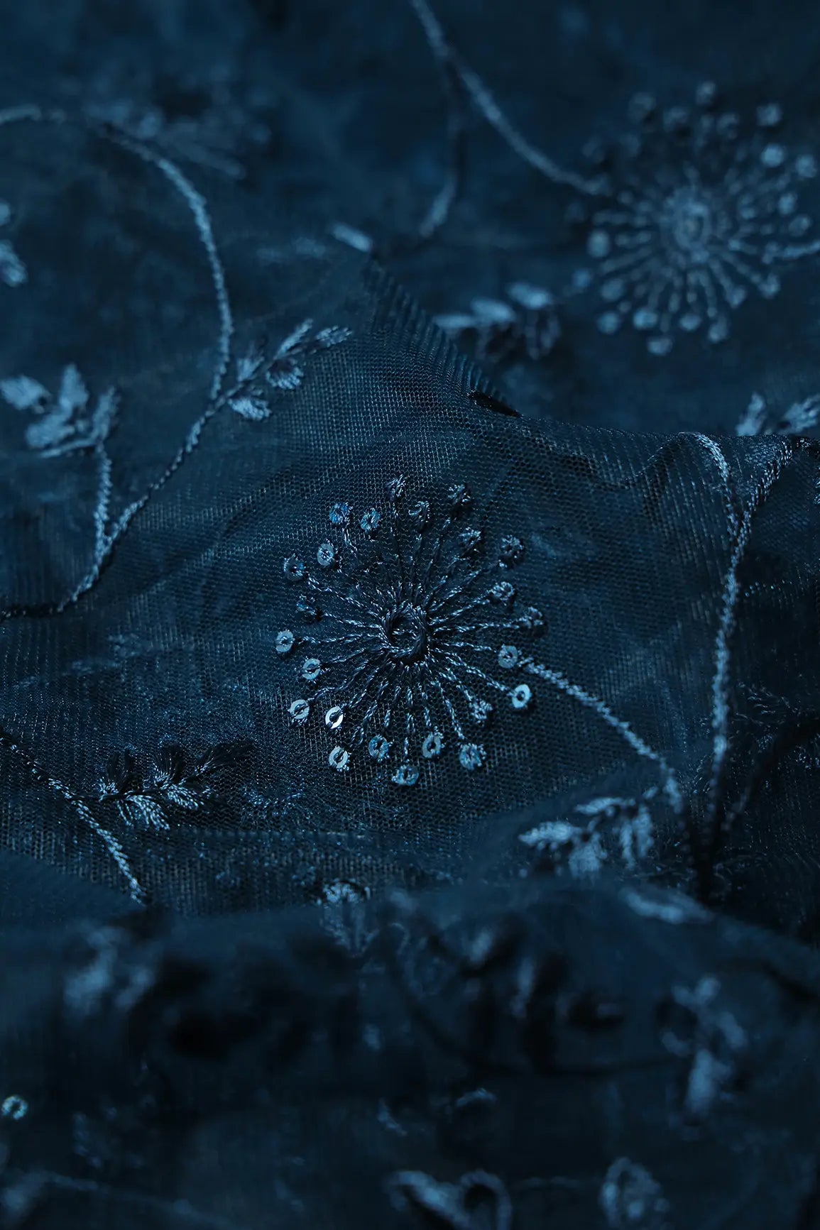 AIzaSyBcstauz-XMPRhEY21AUzeo032pxrXB5Ug - Blue Sequins With Blue Thread Floral Embroidery On Prussian Blue Soft Net Fabric