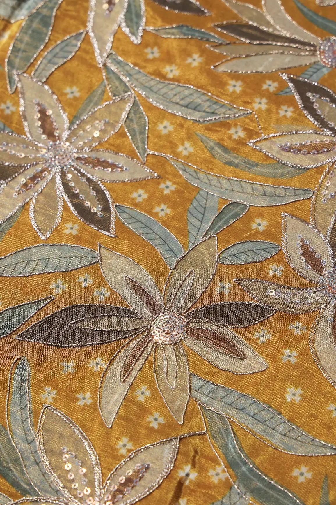 AIzaSyBcstauz-XMPRhEY21AUzeo032pxrXB5Ug - Floral Position Print On Sequins With Zari Embroidery Mustard Yellow Viscose Zari Tissue Fabric