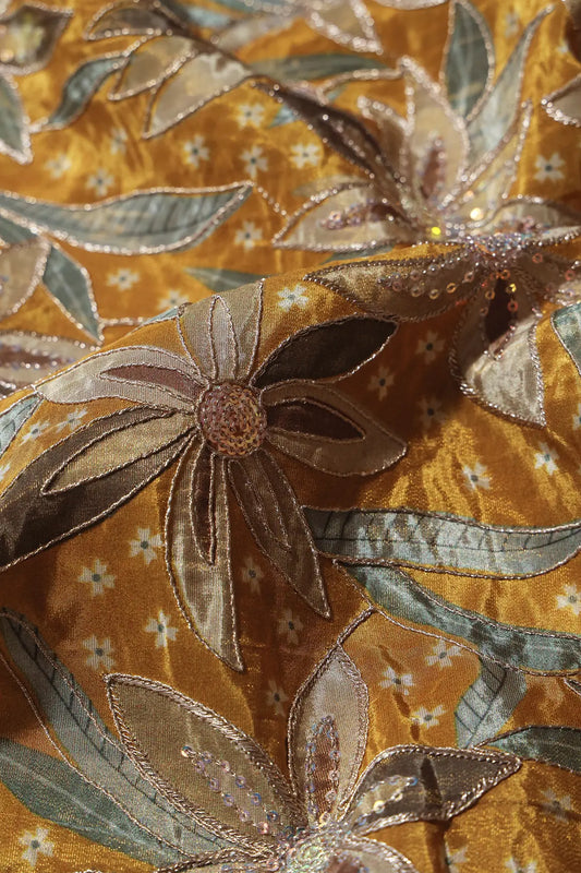 AIzaSyBcstauz-XMPRhEY21AUzeo032pxrXB5Ug - Floral Position Print On Sequins With Zari Embroidery Mustard Yellow Viscose Zari Tissue Fabric