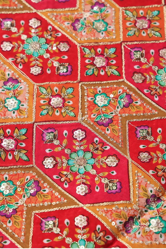 Red And Orange Traditional Positional Print With Gold Zari And Sequins Embroidery On Crepe Fabric